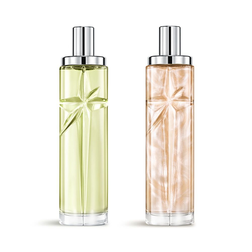 Starlicious the creamy delight paquet superpose avec Pineapple Musk et Pistachio Praline, des bouteilles en verre avec une etoile filante sculptee, ses facettes brillant sous un capuchon argente elegant.