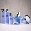 trois flacons bleu ANGEL, un flacon de parfum bleu en forme d'etoile et un pot de creme bleu.
