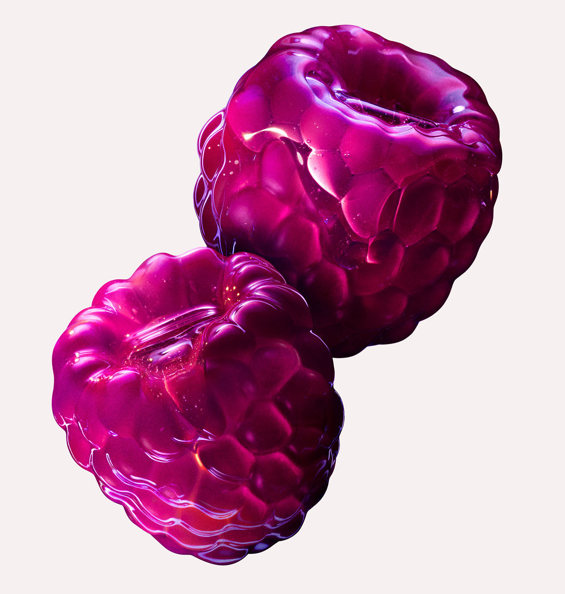 deux framboises roses juteuses sur un fond clair